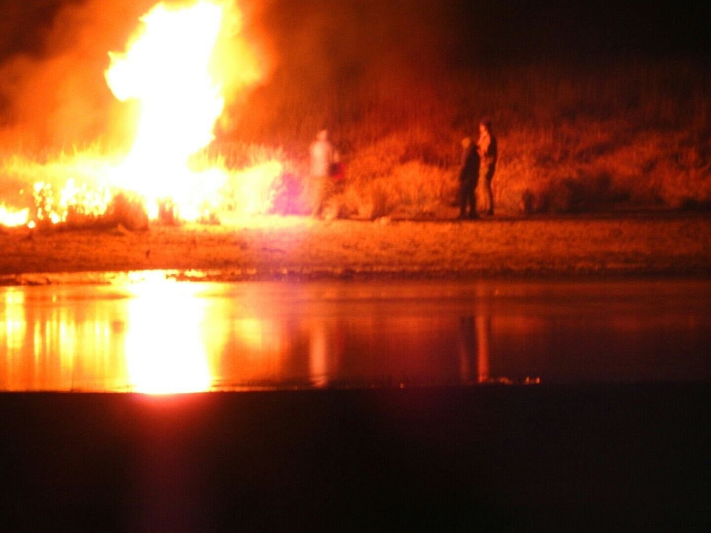 Police and about 400 people who were protesting the Dakota Access Pipeline clashed as demonstrators lit cars on fire and police launched tear gas and water at the crowds. (credit: Morton County Sheriff)